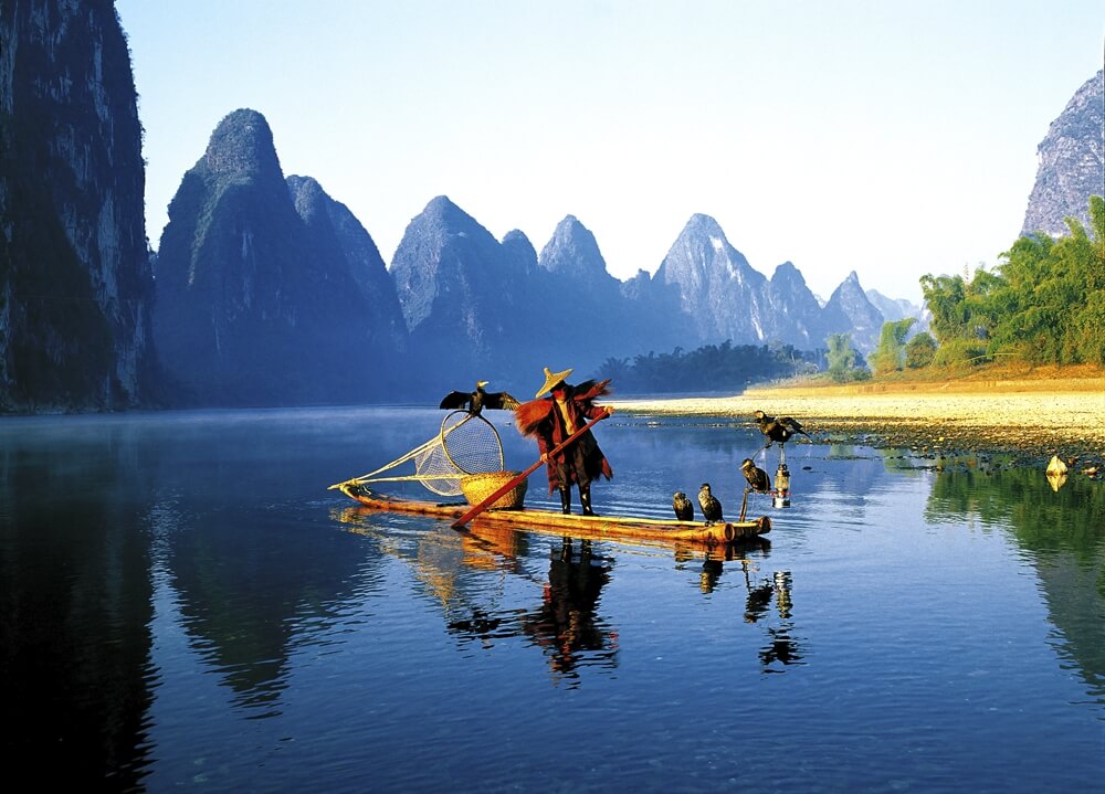 Take a photo of the famous Cormorant fishermen in Guilin, China
