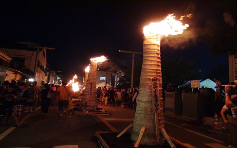 Torches burning Yoshida Fire Festival
